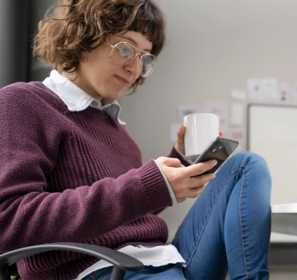 Woman viewing accessible website on her mobile device
